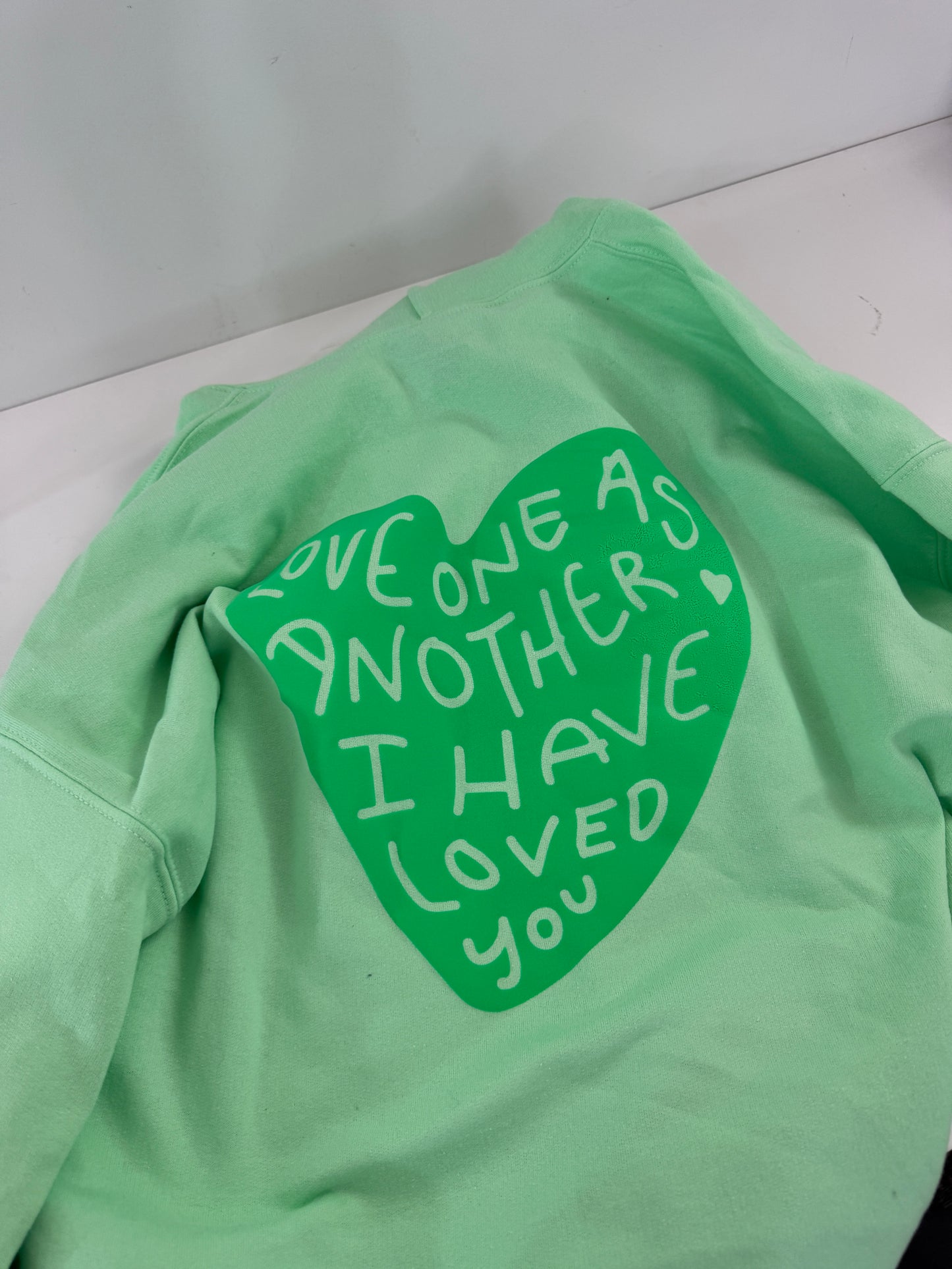 OOPS! Love One Another Hoodies